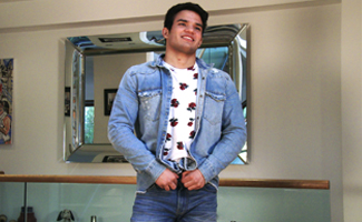 Bonus Video of Javier's Photo Shoot - Young Athletic Wrestler Shows off his Muscles & Solid Uncut Cock!