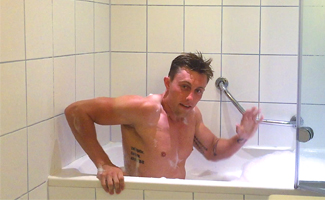 Young Stud Cameron Wanks his Big Uncut Cock in a Bath Whilst Travelling around Europe & Squirts Big!